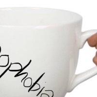 Giant Coffee Mug with Xenophobia written on the side